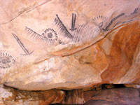 Wilder K&uuml;rbis wuchert zwischen den Ruinen